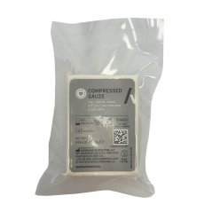 Primed compressed gauze